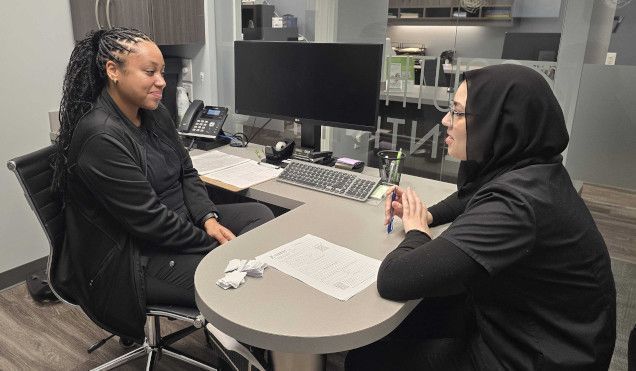 student going over class tasks